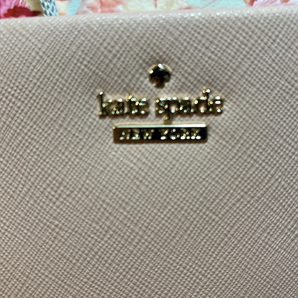 Kate Spade Bag gold name on outside of bag, pink leather, gray and white lining - Picture 3 of 9